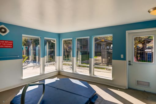a dining room with windows and a table