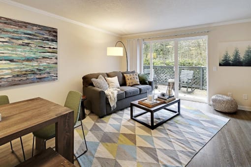 a living room with a couch and a table