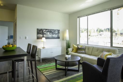 a living room with a couch and a table
