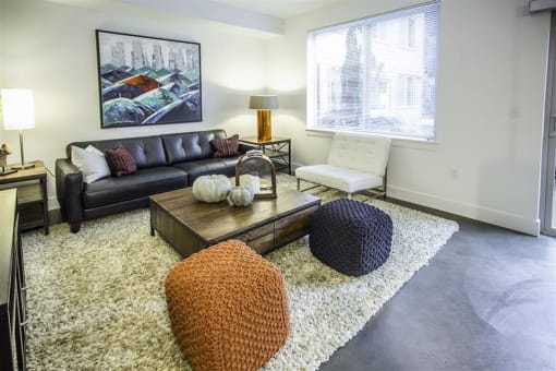 a living room with a couch and a table