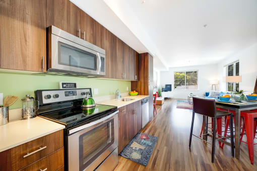 a kitchen with a stove and a microwave