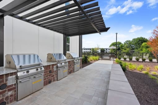 the preserve at ballantyne commons outdoor kitchen with stainless steel appliances