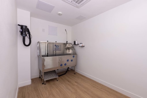a room with a machine in the corner of it at Element 12 Apartments, Henderson NV