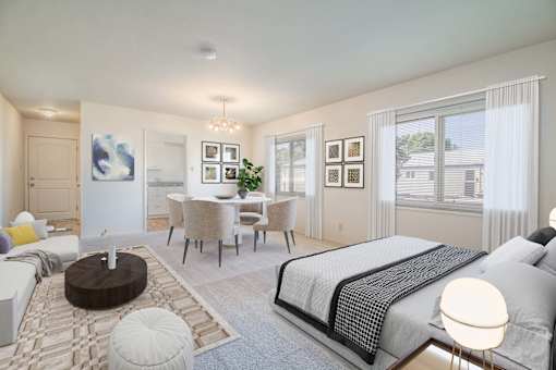a bedroom with a bed and a dining room at Hillsdale Garden Apartments,California 94403