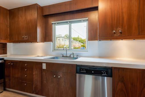 Kitchen with brown cabinets at Hillsdale Garden Apartments, San Mateo, CA 94403
