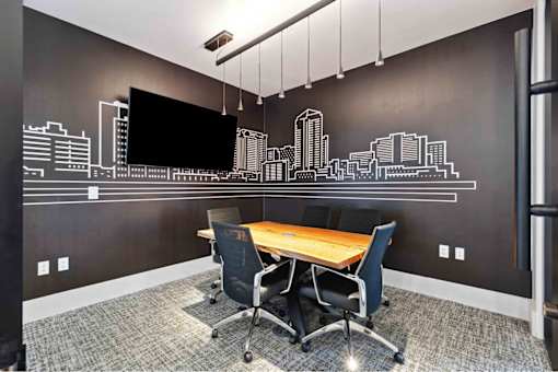 our office has a large conference room with a table and chairs