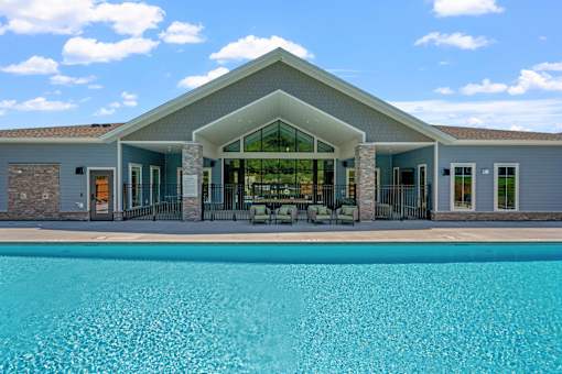 Clubhouse and pool view at The Lodge at Overland townhome rentals in Rochester, MN.