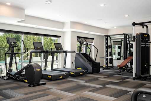 Gym with treadmills and elliptical machines at The Westlyn luxury apartments in St. Paul, MN
