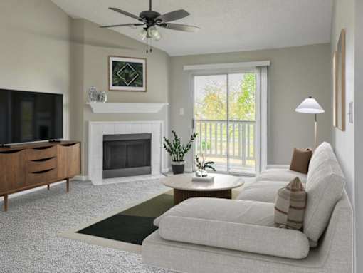 Living room with fireplace and arcadia door at Riverset Apartments waterfront apartments in Memphis, TN.