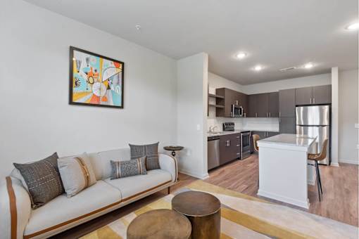Open living room and kitchen with plank flooring throughout