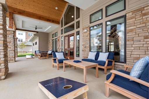 Outdoor lounge seating and yard games at Brandywine Green