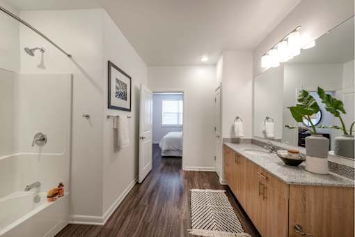 Elegant bathroom with dual sinks and under-the-counter storage