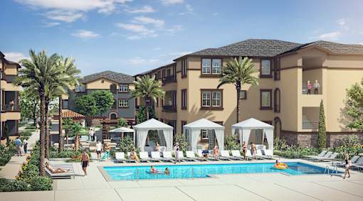 A swimming pool surrounded by palm trees and lounge chairs.