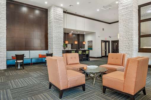 A room with a table and chairs in it.