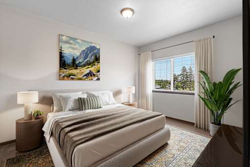A bedroom with a large bed and a painting on the wall.