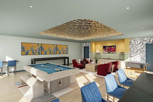 Lounge with blue billiard table at Autry at Legacy apartments for rent in Prosper, TX.