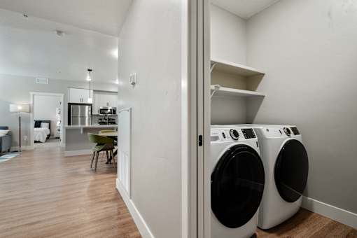 A laundry room with a washer and dryer.