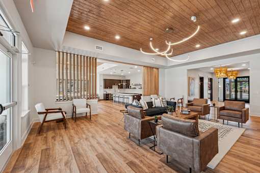 A modern living room with wooden floors and furniture.