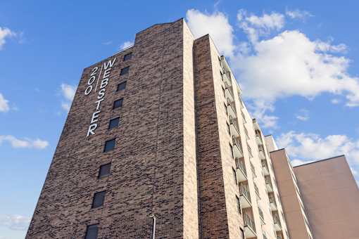 The Wester building is made of brick and has a tall, narrow structure.