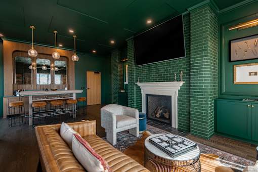 A living room with a fireplace and a television.