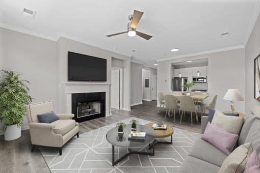 a living room with a fireplace and a table