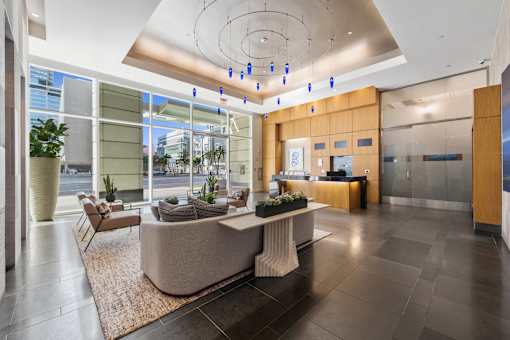 A reception area with a desk and chairs.