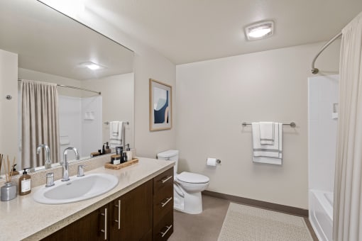 a bathroom with a sink toilet and showerat Allez, Redmond