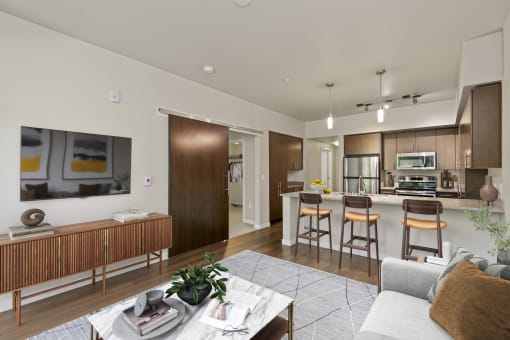a kitchen and living room in a 555 waverly unitat Allez, Washington, 98052