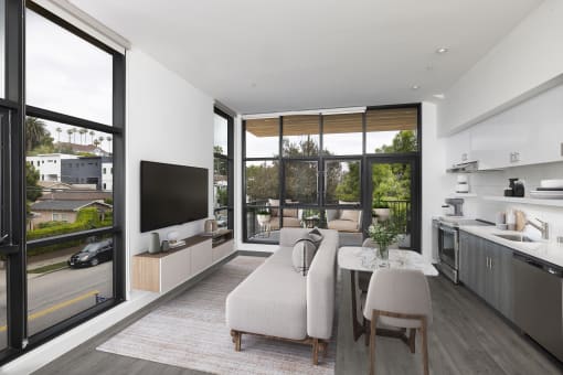 Living room with large window at Edendale Crossing, California