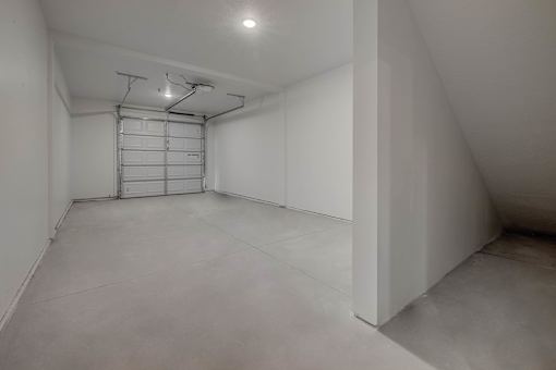 A white room with a white ceiling and a white floor.