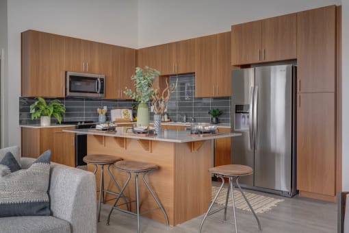 Kitchen with Wooden Cabinets at The Heights at Legend Hills, Clearfield