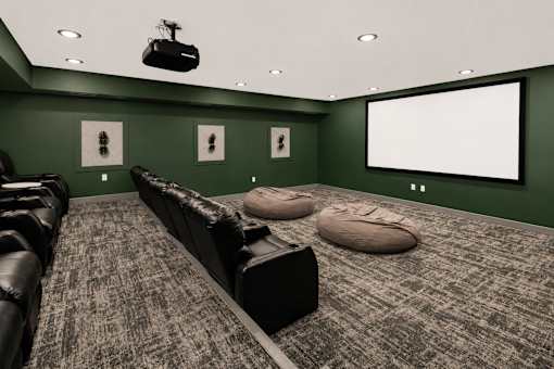A home theater with a large screen and comfortable seating.