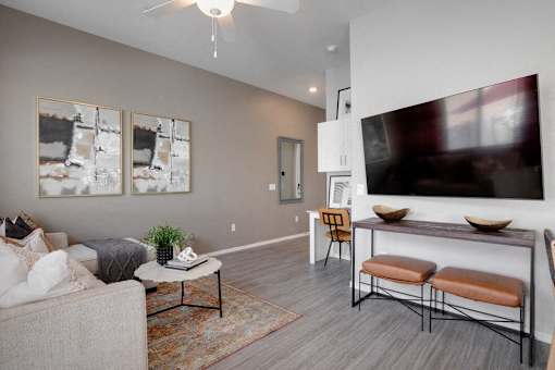 a living room with mounted tv