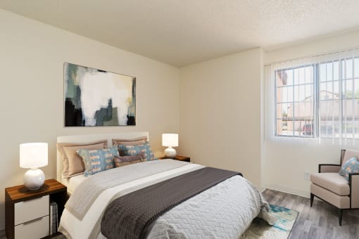 a bedroom with a bed and a window
