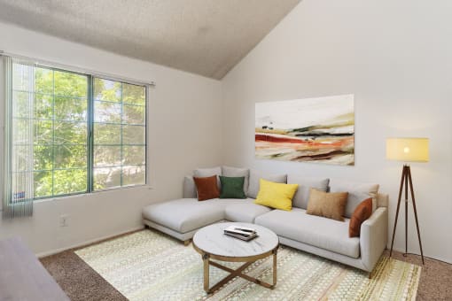 a living room with a couch and a coffee table