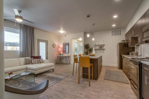 furnished model living room and kitchen