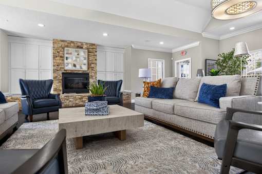 Elegant clubhouse lounge with modern furnishings at The Ivy at Gatehouse Apartments, Orlando, 32807