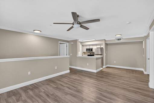 Room with ceiling fan at Mer Soleil Apartments, Naples, FL