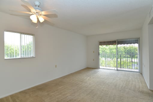Living Room With Expansive Window at St. Andrews Palm Beach Apartments, West Palm Beach , 33411