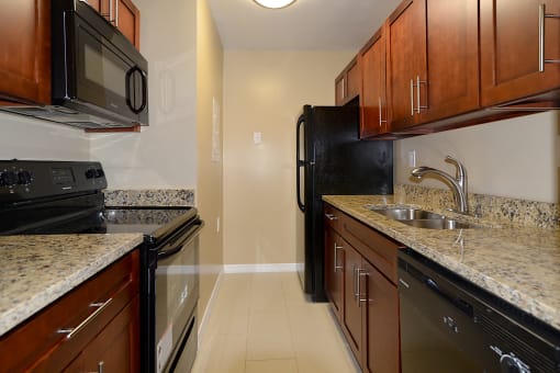 Fully Equipped Kitchen In Clubhouse at St. Andrews Palm Beach Apartments, West Palm Beach