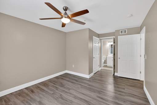 Vacant room with ceiling fan at Mer Soleil Apartments, Florida