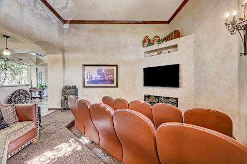 Theater room with leather seating and television at Borgata Condominiums Apartments, Las Vegas, 89103