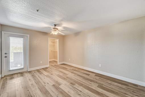 Empty bedroom with walk-in closet access at Borgata Condominiums Apartments, Nevada, 89103