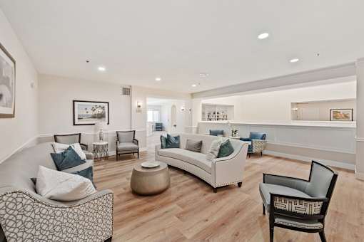 a living room with couches and chairs at Azure Point at Encinitas, Encinitas