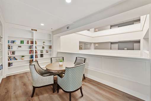 a dining area with a small table and four chairs at Azure Point at Encinitas, Encinitas California