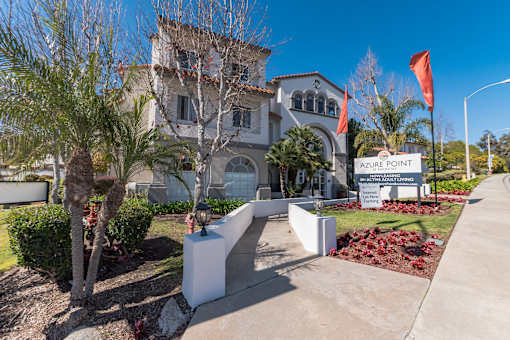a large white house with palm trees in front of it at Azure Point at Encinitas, Encinitas, 92024