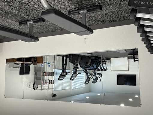 A glass wall separates the ceiling from the room.