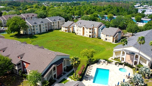 Aerial view of resort style pool and spa at The Ivy at Gatehouse Apartments, Florida