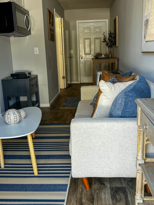 a living room with a couch and a table