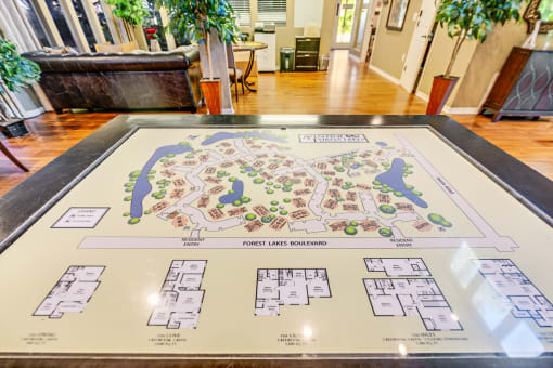 a map of the resort is displayed on a table in the lobby